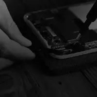 Removing a screw from a phone